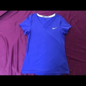 Purple Nike drifit workout shirt